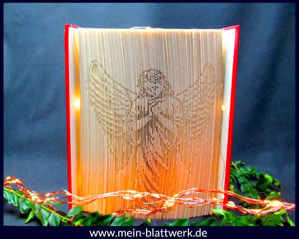 Kostenlose Buchfalten-Vorlage zum Ausdrucken. Einen Engel in ein Buch falten. Schattenfaltung Motiv Engel.