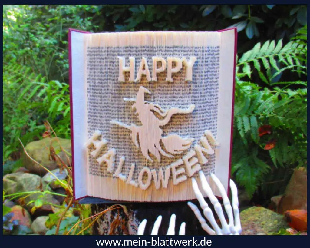 Happy Halloween in ein altes Buch falten mit einer kleinen Hexe.