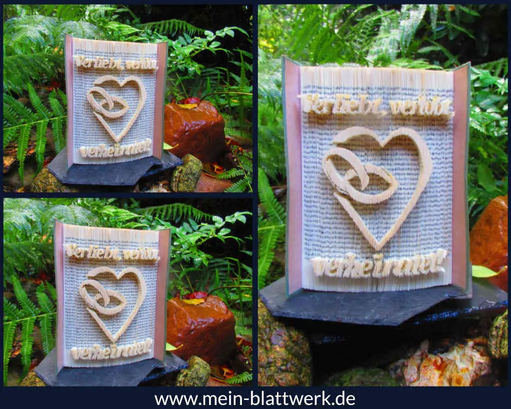 Kostenlose Buchfalten-Vorlage zum Ausdrucken für ein Hochzeitsbuch. Ein Herz mit Eheringen in einem Buch als Hochzeitsgeschenk.