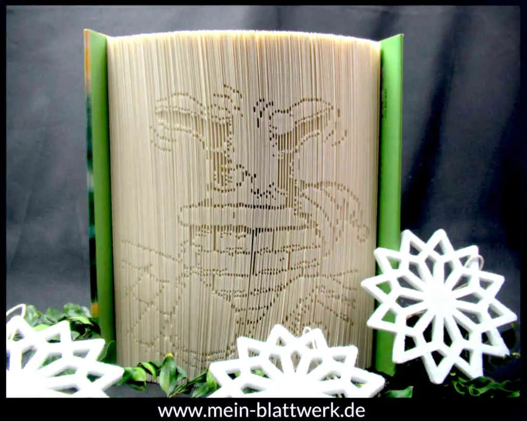 Bastel-Idee zu Weihnachten. Erstelle ein gefaltetes Buch mit dem Motiv "Santa Claus im Schornstein". Kostenlose Vorlage zum Ausdrucken. Buchfalten-Weihnachtsvorlagen.